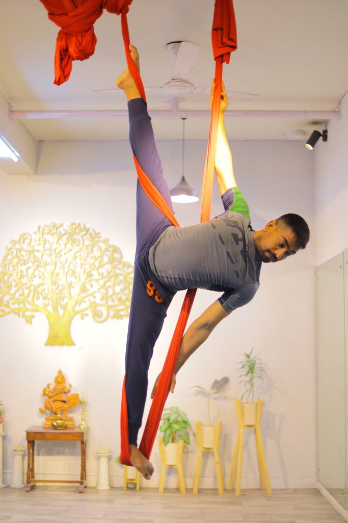 Aerialist Doing Yoga on a hammock