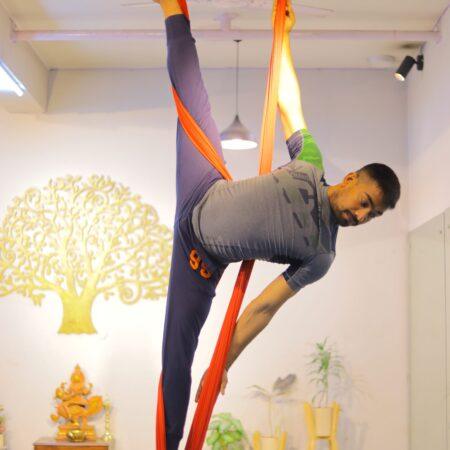 Aerialist Doing Yoga on a hammock