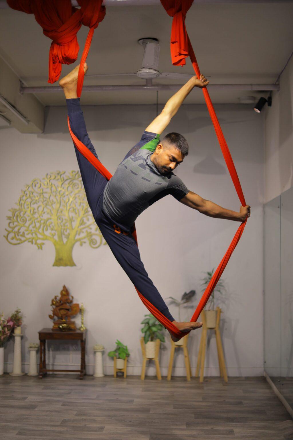 Aerialist Doing Yoga pose on Hammock