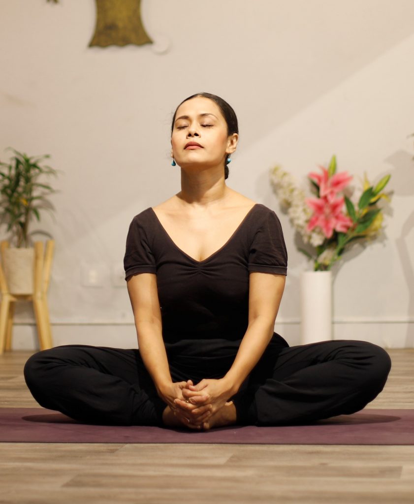 Yogini In Yoga Studio