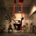 aERIAL yOGA pOSE ON hAMMOCK