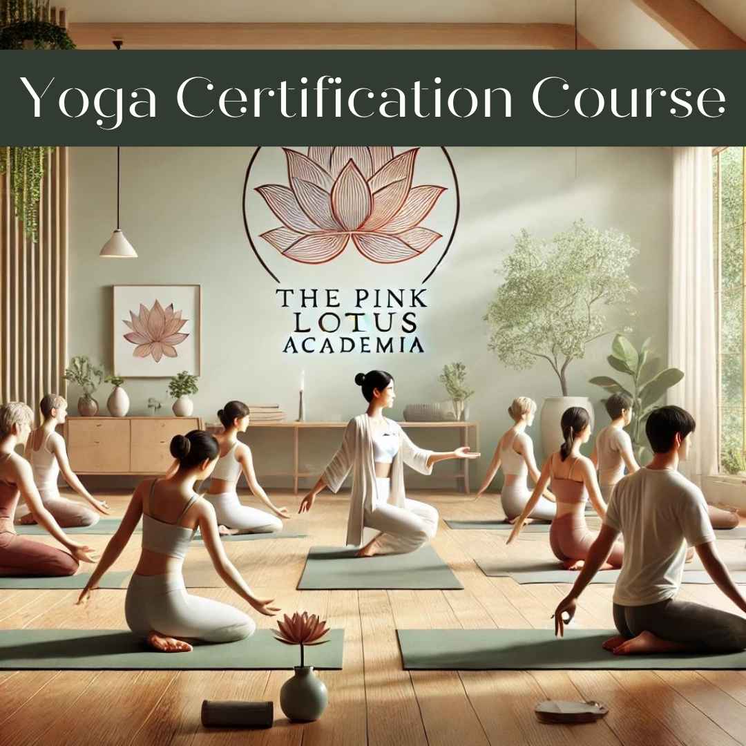 A serene yoga class at The Pink Lotus Academia, featuring students practicing various yoga poses under the guidance of an instructor. The setting includes a minimalistic yoga studio with natural light, wooden floors, and greenery, reflecting a calming and professional environment for yoga teacher training.