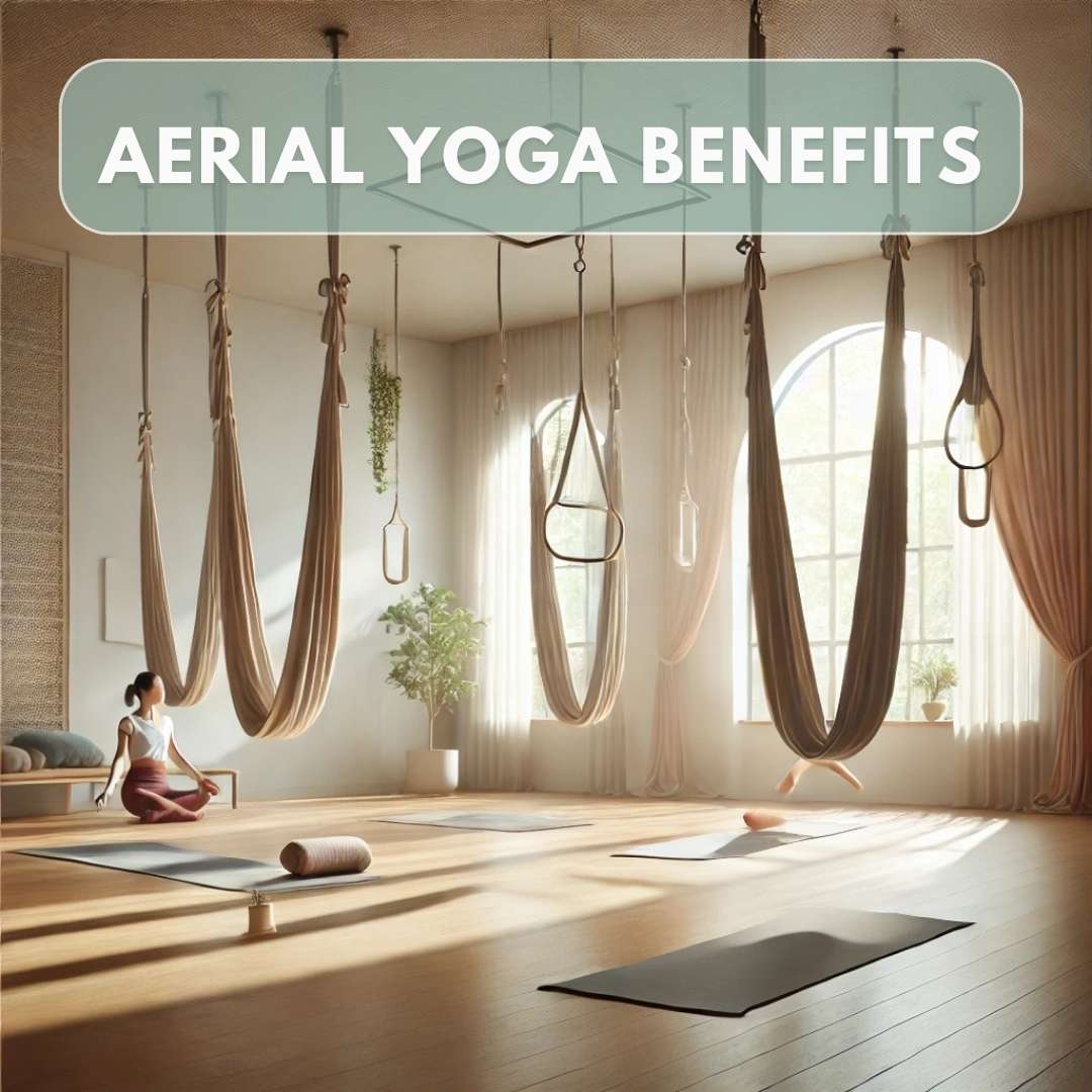 A calming yoga studio with aerial yoga hammocks suspended from the ceiling, bathed in gentle natural light. The setting features a minimalistic design with earthy tones, and a few practitioners are engaged in simple aerial yoga poses, showcasing a serene and inviting environment ideal for beginners.